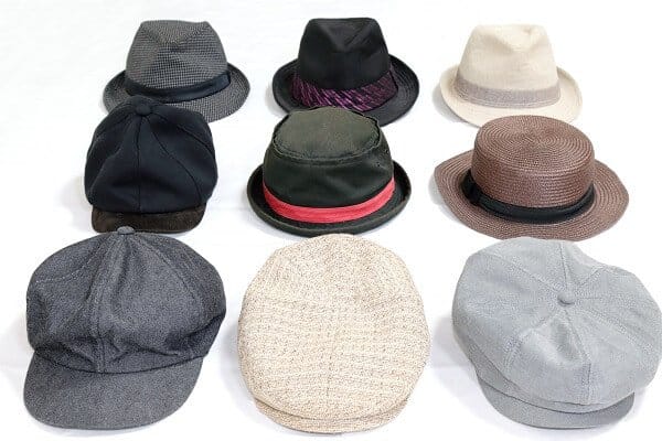 9 hats on white background