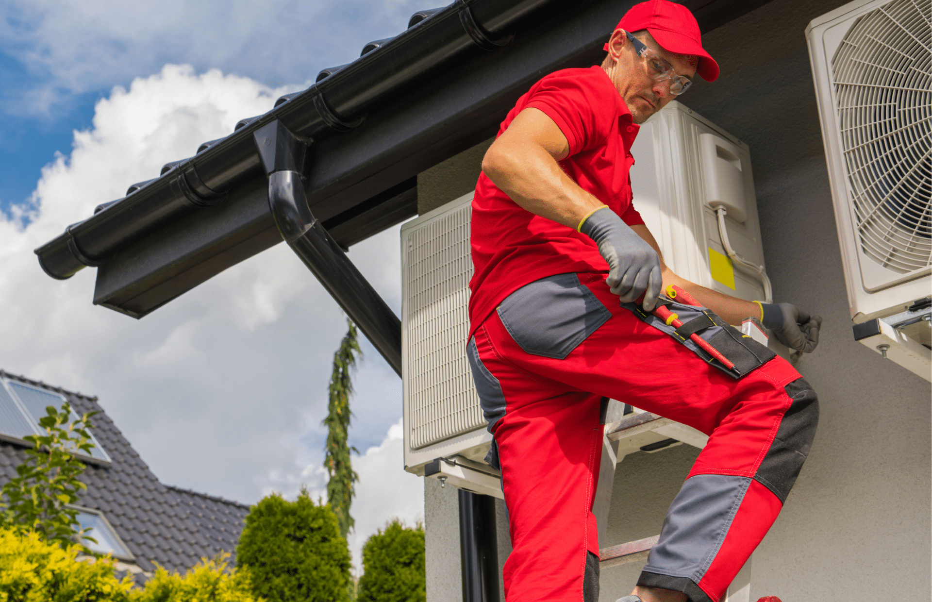 HVAC worker fixing